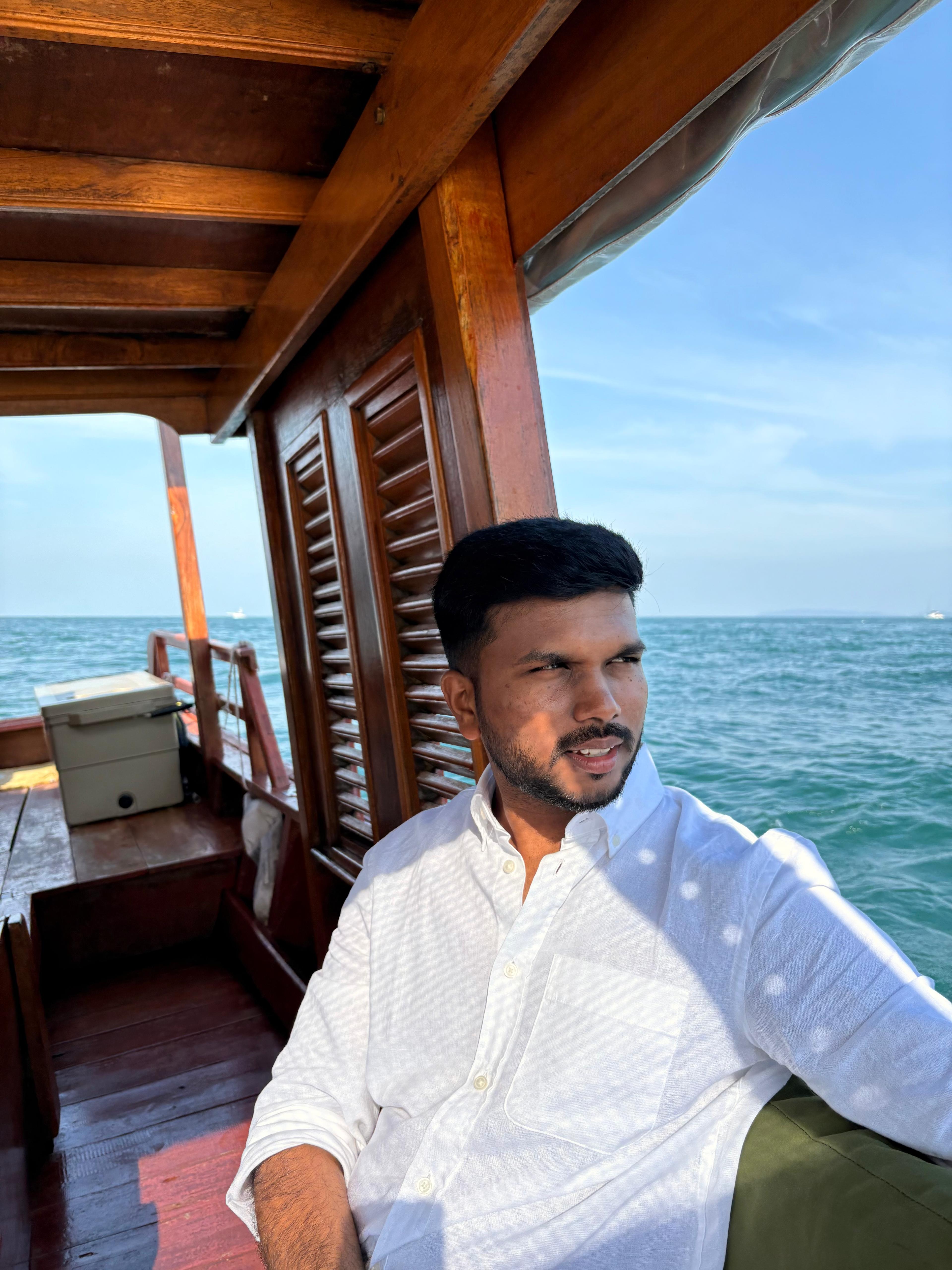 Parag on a wooden boat at sea